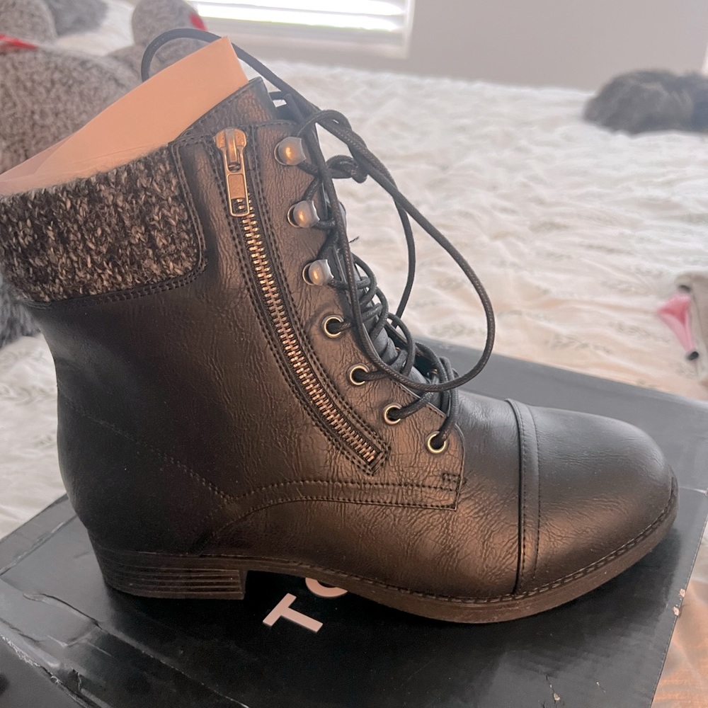 Black sweater top hiker boots